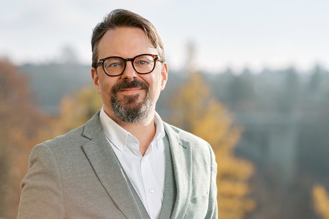 Portrait de Krispin Romang, directeur de Swiss eMobility.